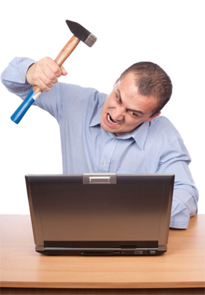 Man Hitting Laptop